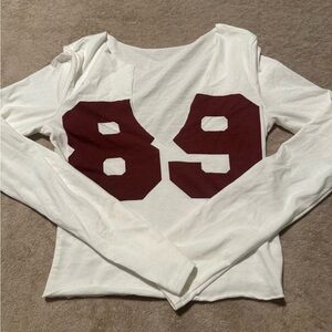 SHEIN White Long Sleeve Top with Burgundy Numbers